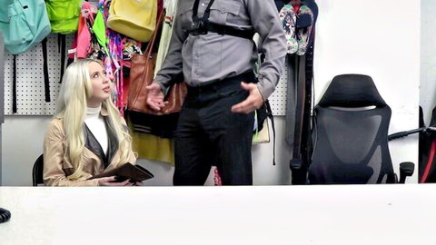 Blonde babe in coat gazes up at stern store security guard in roleplay tease
