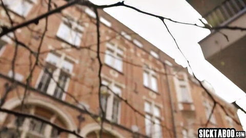 Simony Diamond MILF in urban building tease, branches frame