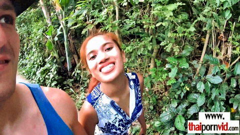 Petite Thai teen Cherry smiles with BWC lover outdoors before hot action