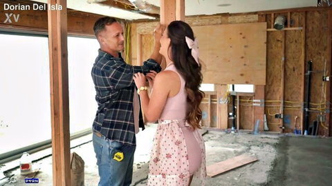 Construction worker gropes busty brunette's hips in tight pink skirt from behind on site
