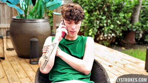 Tattooed guy in green tank top on phone call with Willow Ryder, Family Strokes
