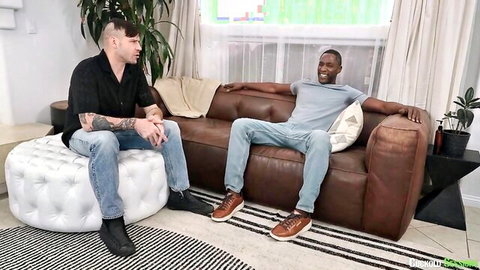 Tattooed white cuck and handsome black bull chatting on couch before rough cuckold sex