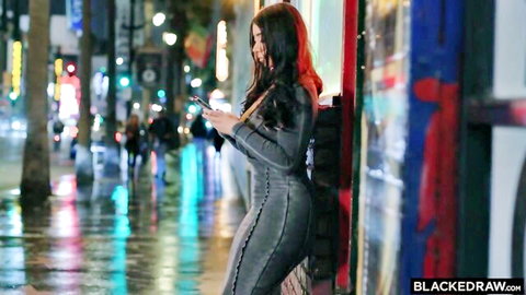 Curvy brunette baddie with huge ass in tight dress on rainy neon street