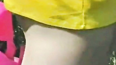 Vintage teen schoolgirl in pink skirt and yellow top exposing pale skin