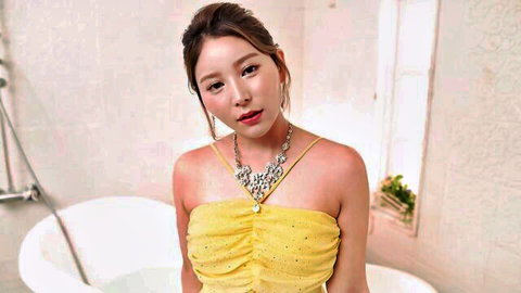 Erika Shiomi in sparkling yellow dress, seductive cleavage tease