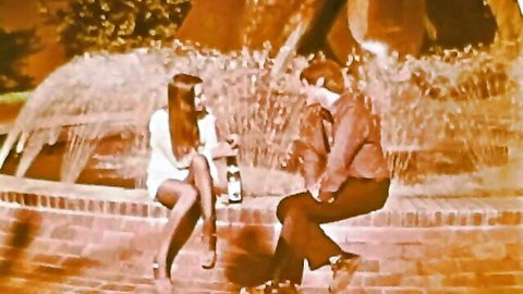 Retro young skinny girl in white dress with guy by fountain vintage porn
