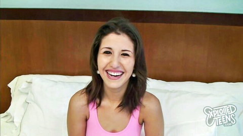 Missi Daniels smiling brunette in pink tank top, sexy teen preview