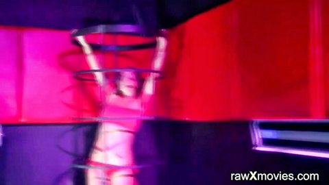 Hot blonde MILF in pink lingerie performs aerial kink at fetish bar party