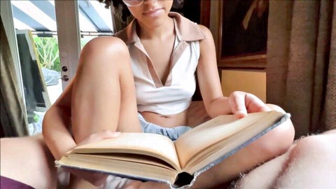 Dani Diaz, sexy Latina babe reading book in crop top and shorts