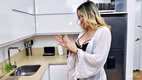 Monique Fuentes in black lace lingerie and sheer robe, seductive tease