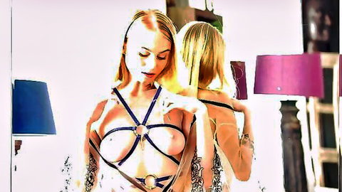 Nancy A blonde in black harness exposing tits, adjusting straps on topless blonde