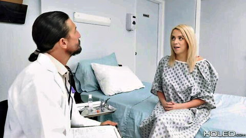 Blonde Madison Summers in hospital gown examined by Asian doctor