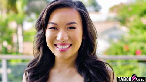 Petite Asian Kimmy Kimm smiling in outdoor tease for POV spanking video