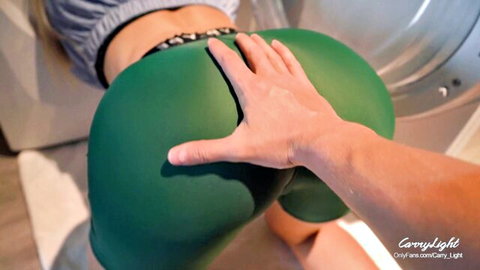 CarryLight step-mom stuck in washer, hand grabbing her big ass in green shorts