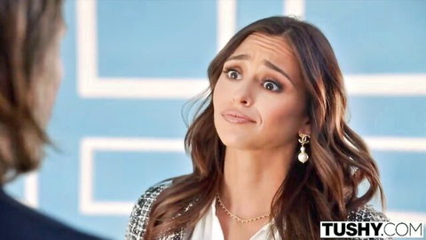 Armani Black looks surprised in office attire with Mick Blue in Tushy scene