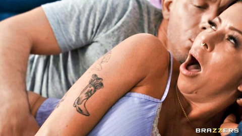 Tattooed Latina babe with wide open mouth moans in ecstasy as guy kisses her neck passionately