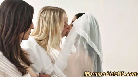 Chloe Cherry in Mormon Girlz lesbian wedding kiss with veiled bride