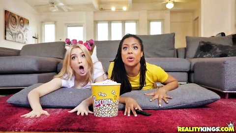 Anastasia Knight and Kira Noir surprised with popcorn in playful scene