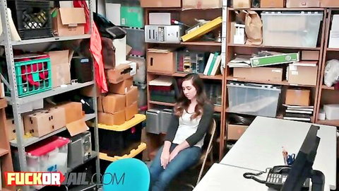 Teen thief in white top sits relaxed in storage office, Team Skeet security catch scene