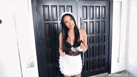 Petite brunette maid in sheer black lace bra and tiny white frilly skirt holding toy seductively