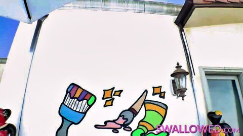 Swallowed.com graffiti art with colorful dripping paintbrushes and stars on white wall