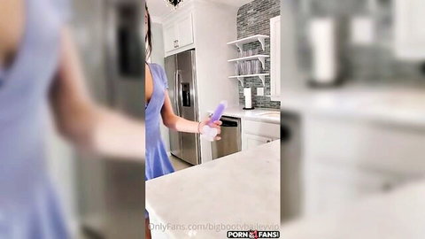 Bailey in purple dress masturbating with kitchen dildo