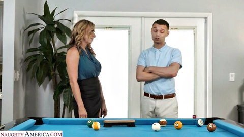 Mature blonde stepmom in tank top and skirt chats with young Johnny by pool table