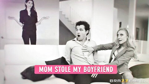 Shocked brunette girlfriend watches blonde MILF mom seduce her boyfriend on couch