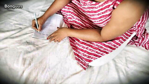 Bonguus in red striped dress writing intimately on bed, Indian taboo stepdaughter