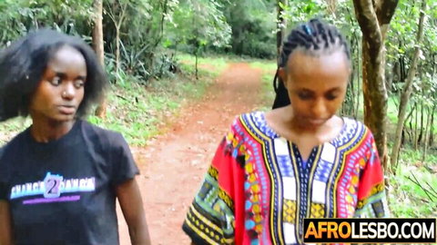 Petite African lesbians Seryo and Lola B walking in forest path