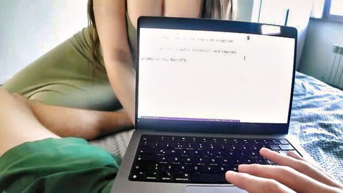 Cumatoz teasing in green leggings while viewing laptop on bed