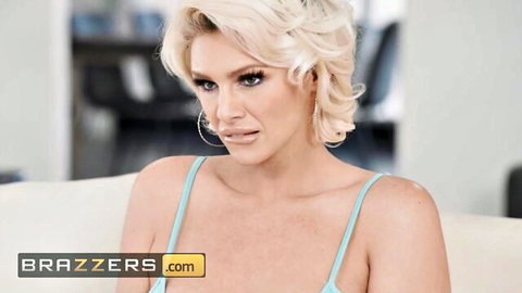 Blonde Charli Phoenix in low-cut blue top, sultry gaze for Brazzers FFM threesome