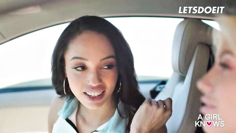 Serene Siren & Ivy Wolfe seductive smiles in car for lesbian threesome