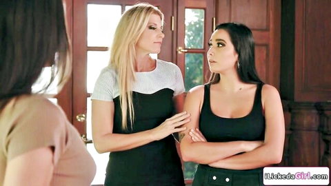 Blonde MILF confronts surprised brunette teen and friend by door in tense taboo scene