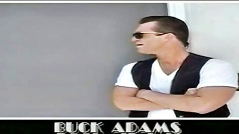 Buck Adams in Barlow Affairs, muscular 90s porn star posing confidently