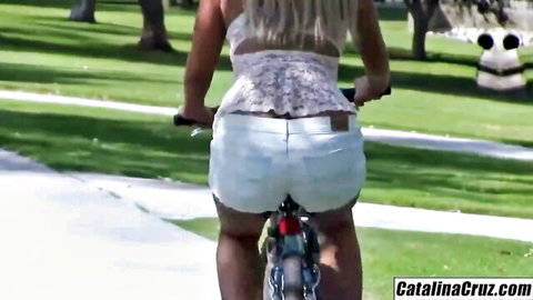 Layla Price blonde babe in tight white shorts on sexy summer bike ride