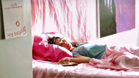 Scarlett Alexis lying asleep in bed on her best birthday