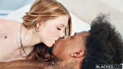 Myra Moans passionately kissing black stud in intimate embrace