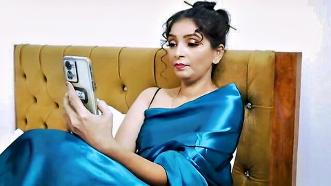 Ipunam in seductive blue saree as Indian stepmom, phone tease
