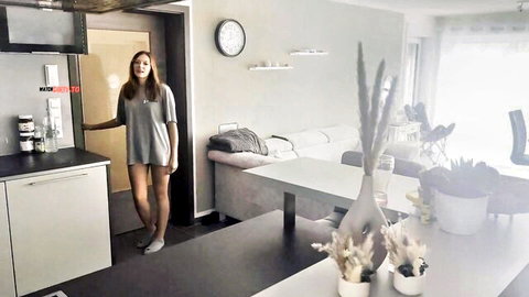 Luckylucy18 in tight grey t-shirt and tiny shorts, teasing in kitchen doorway