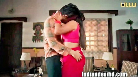 Indian big boobs bhabhi in pink crop top and red skirt passionately kissing man