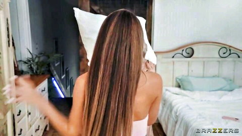 Mackenzie Mace with long brunette hair humping pillow from behind