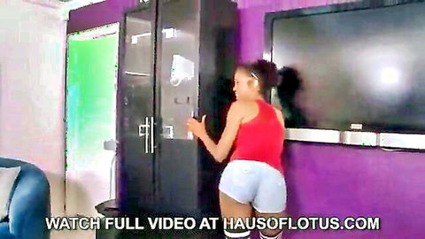 Lotus Lain bends over in tight white shorts, teasing big ebony ass