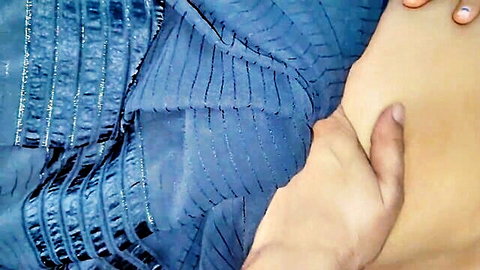 Man's hand groping sexy Indian wife's bare stomach under shiny blue saree