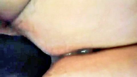 Close-up of creamy mature pussy with visible labia and white discharge