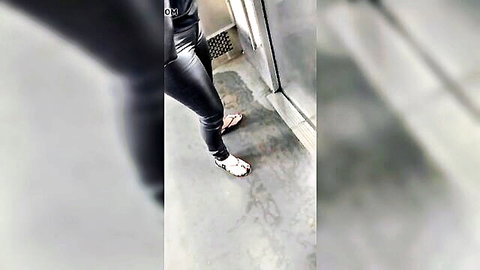Mature sexy MILF legs in tight black pants on train