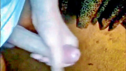 Mature sexy wife giving handjob in leopard print, close-up view