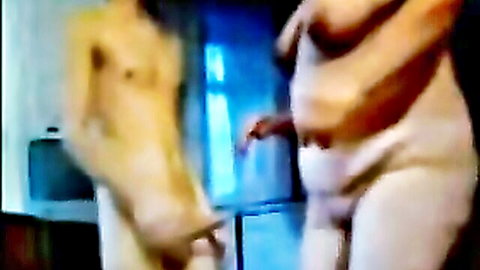 Mature stepmom with big tits touches young boy's cock in amateur video