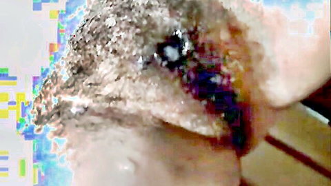 Mature woman's hairy pussy close-up in amateur video