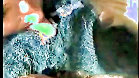 Blonde woman with semen on face and tits in cumshot scene